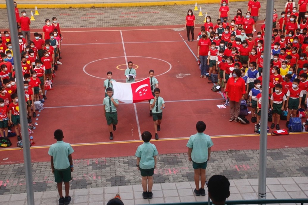 The flag bearers marching in. 